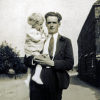 Thumbnail: Percy Ward 1935 holding a child whose name is not known.