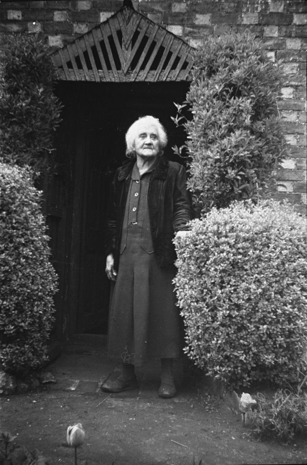 Caroline Hannah Ringham stood in her porch down High Street, Woodford Halse.